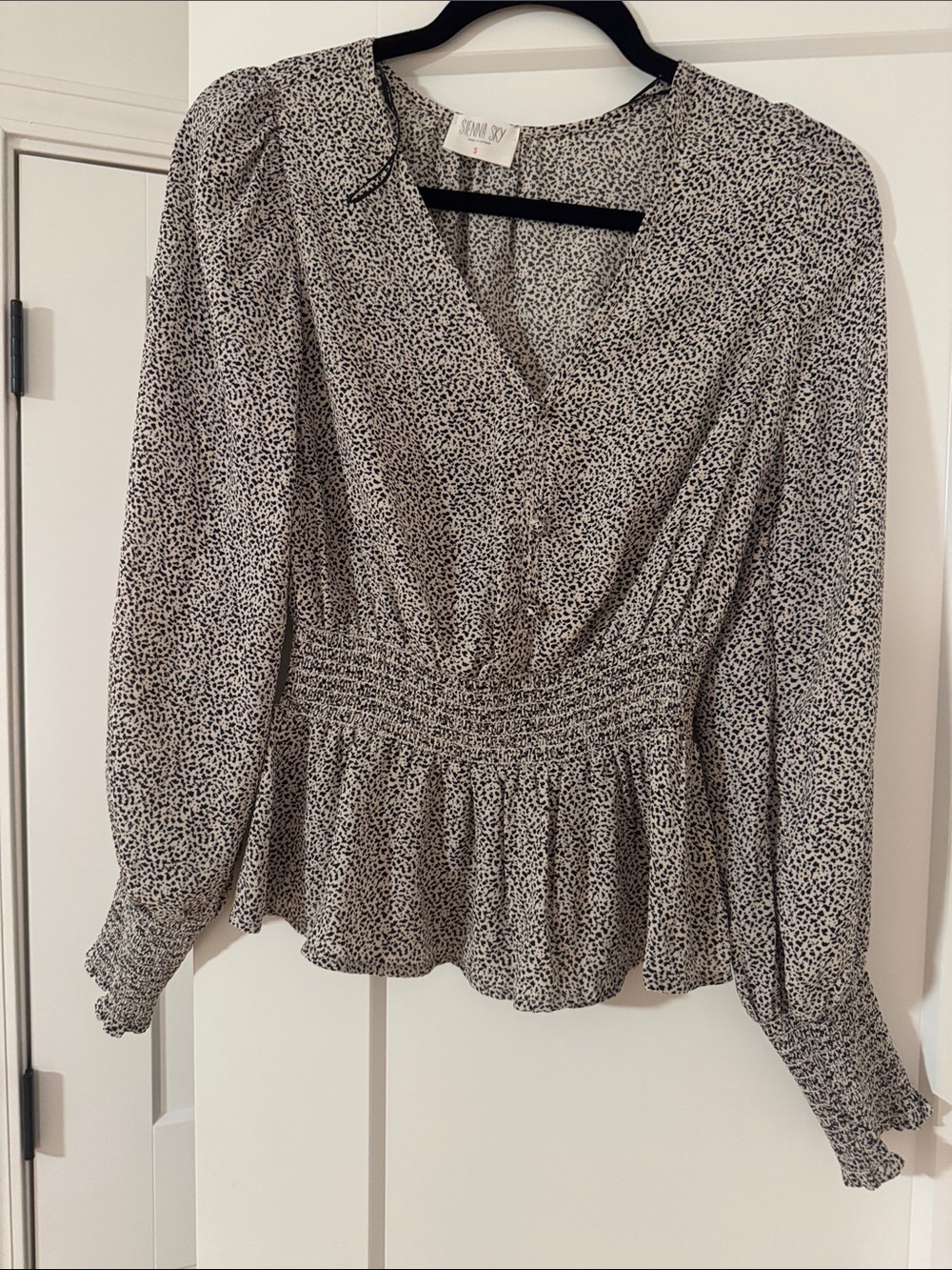 Sienna Sky Black and White Printed Smocked Peplum Top